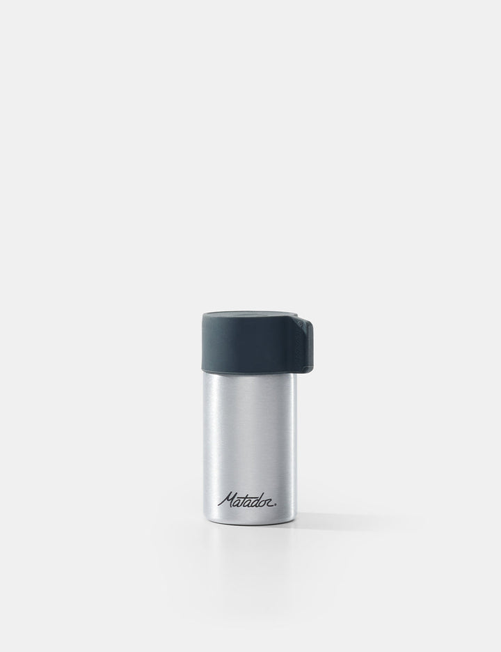 Matador Waterproof Travel Canister - 40ml - silver container with black lid on a white background