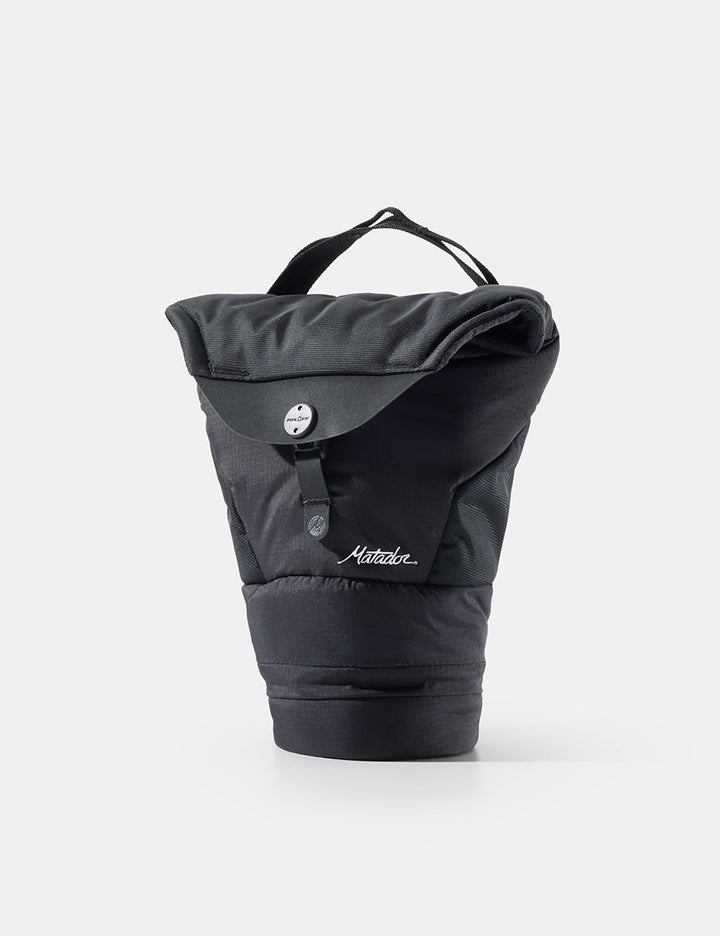 Matador Camera Base Layer 2.0 - black camera base layer with a visible brand logo on a white background