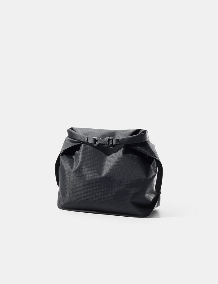 Matador FlatPak Waterproof Toiletry Case (V2) in Black - black toiletry case on a light gray background