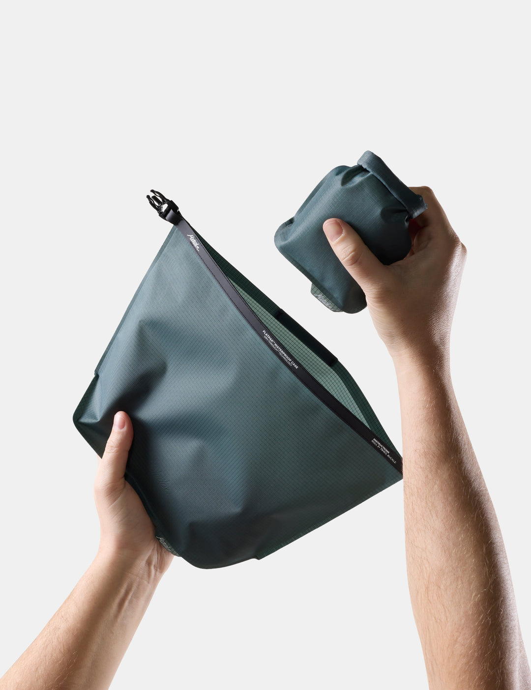Matador FlatPak Waterproof Toiletry Case (V2) in Juniper - blue-green toiletry bag and soap bar case against a light background
