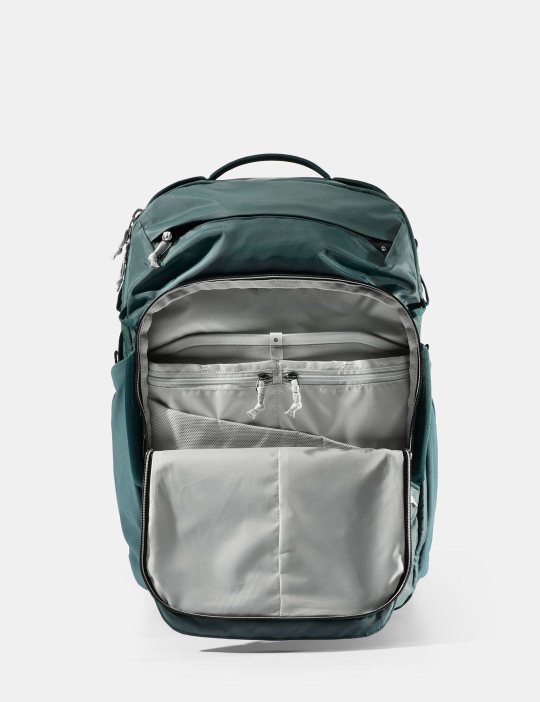 Matador 35L Global Travel Pack in Juniper - green backpack with open compartments on a white background