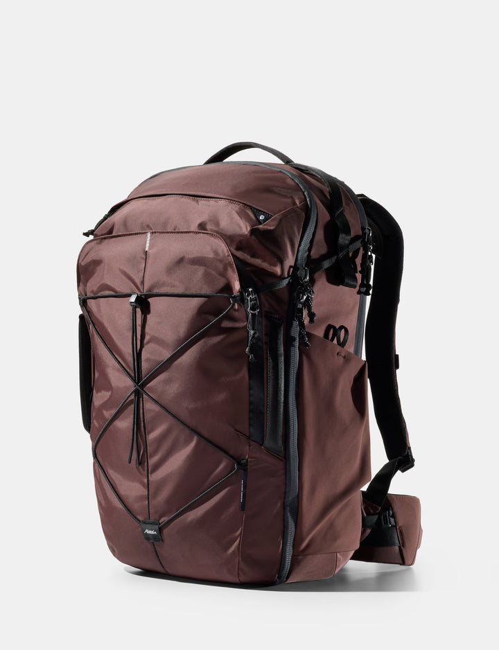 Matador 35L Global Travel Pack in Garnet - garnet backpack with black straps on a white background