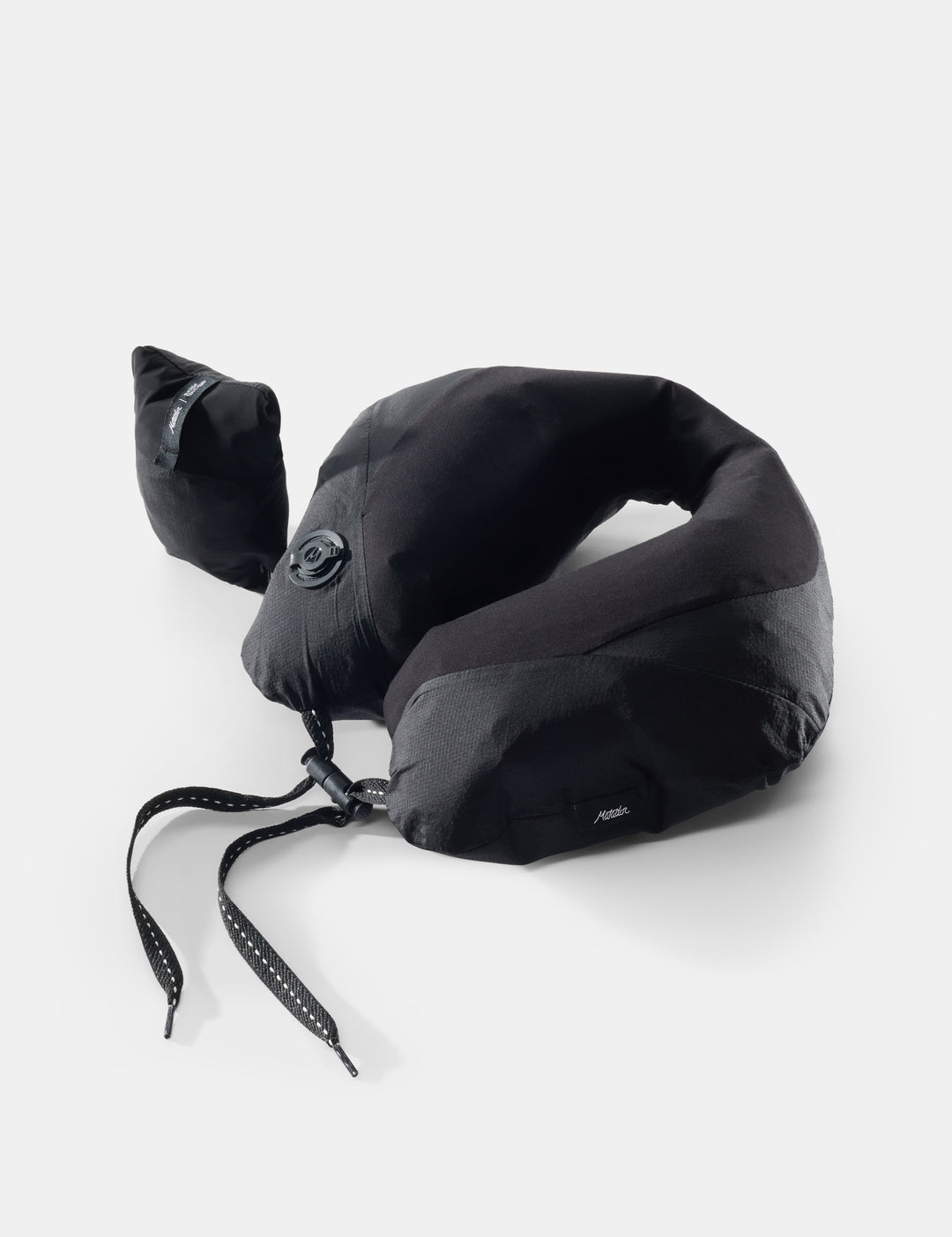 Matador Blackout Travel Pillow - black neck pillow on light gray background