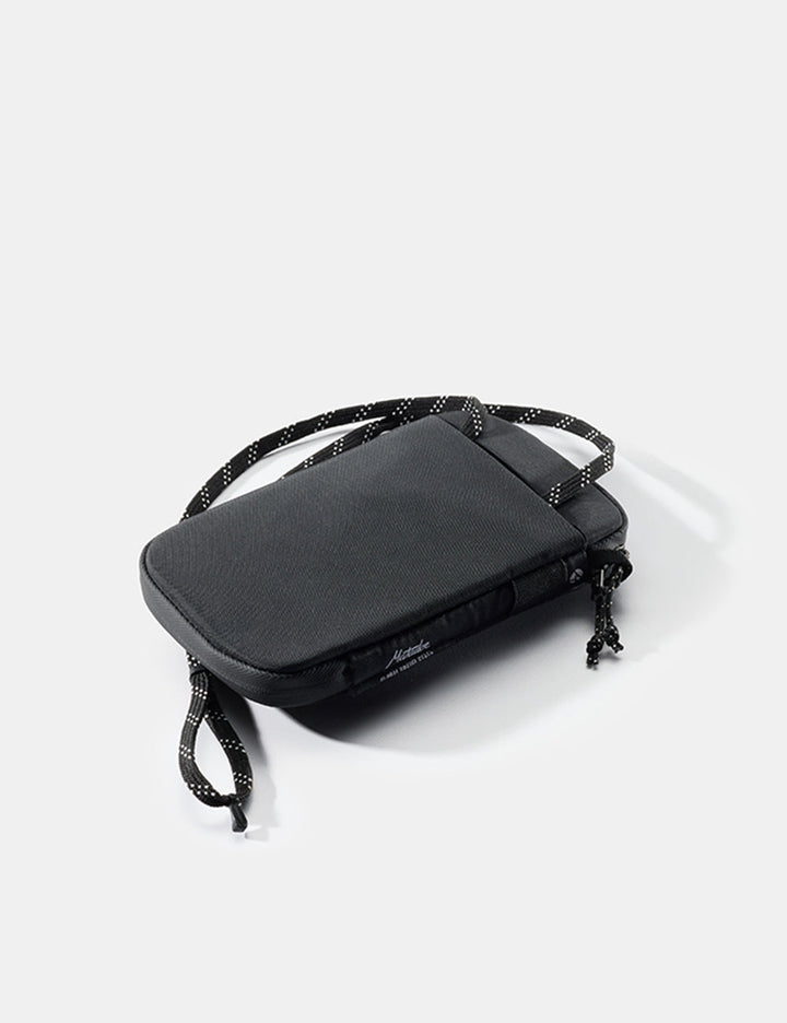 Matador Global Travel Stash in Black - back view of travel wallet with neck lanyard