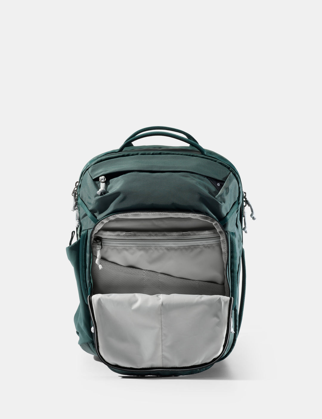 Matador 18L Personal Item Travel Pack in Juniper - green backpack with gray interior on a white background