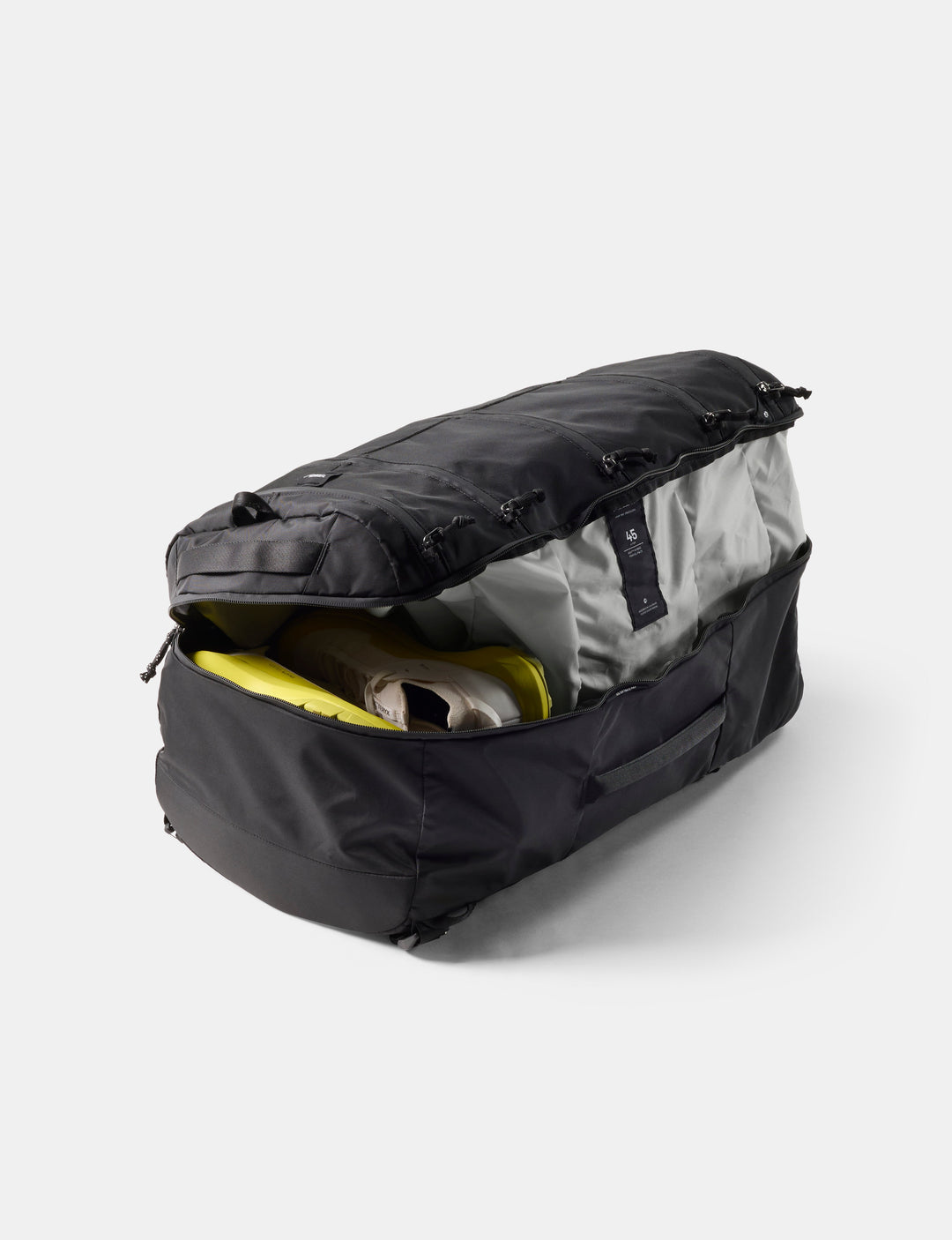 Matador 45L SEG Hybrid Travel Pack in Black - black duffel bag with open top showing gray interior on a white background