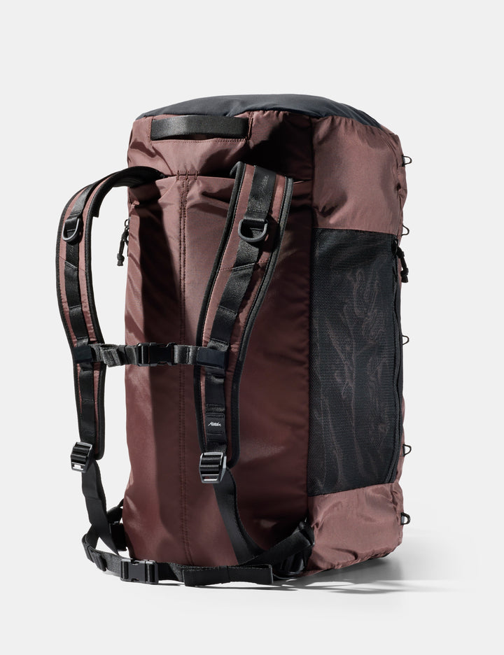 Matador 45L SEG Hybrid Travel Pack in Garnet - garnet backpack with black straps on a white background