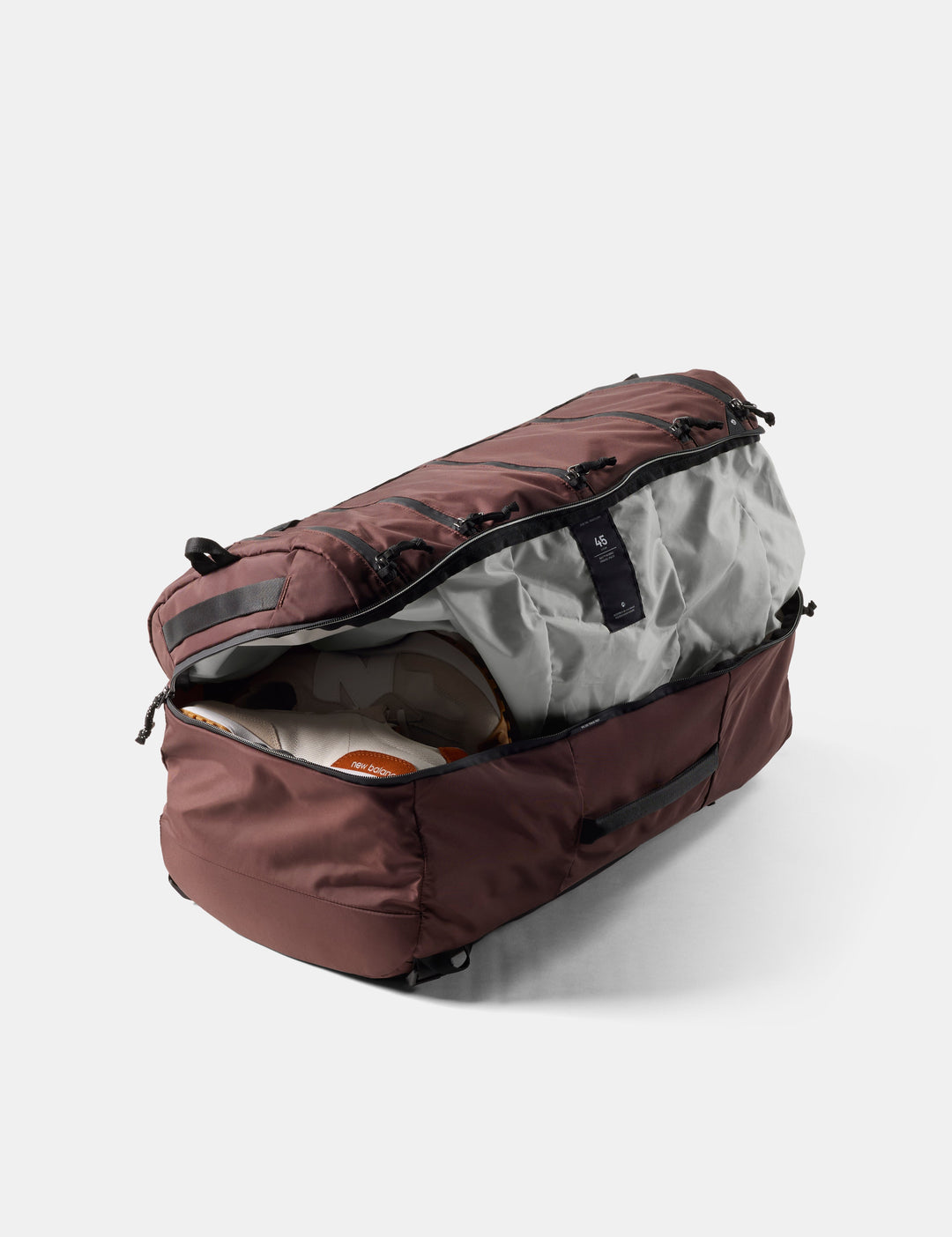 Matador 45L SEG Hybrid Travel Pack in Garnet - garnet duffel bag with open compartment on a white background
