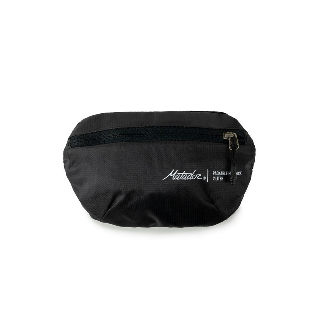 Matador On-Grid Packable Hip Pack folded to its 2L stuff pocket