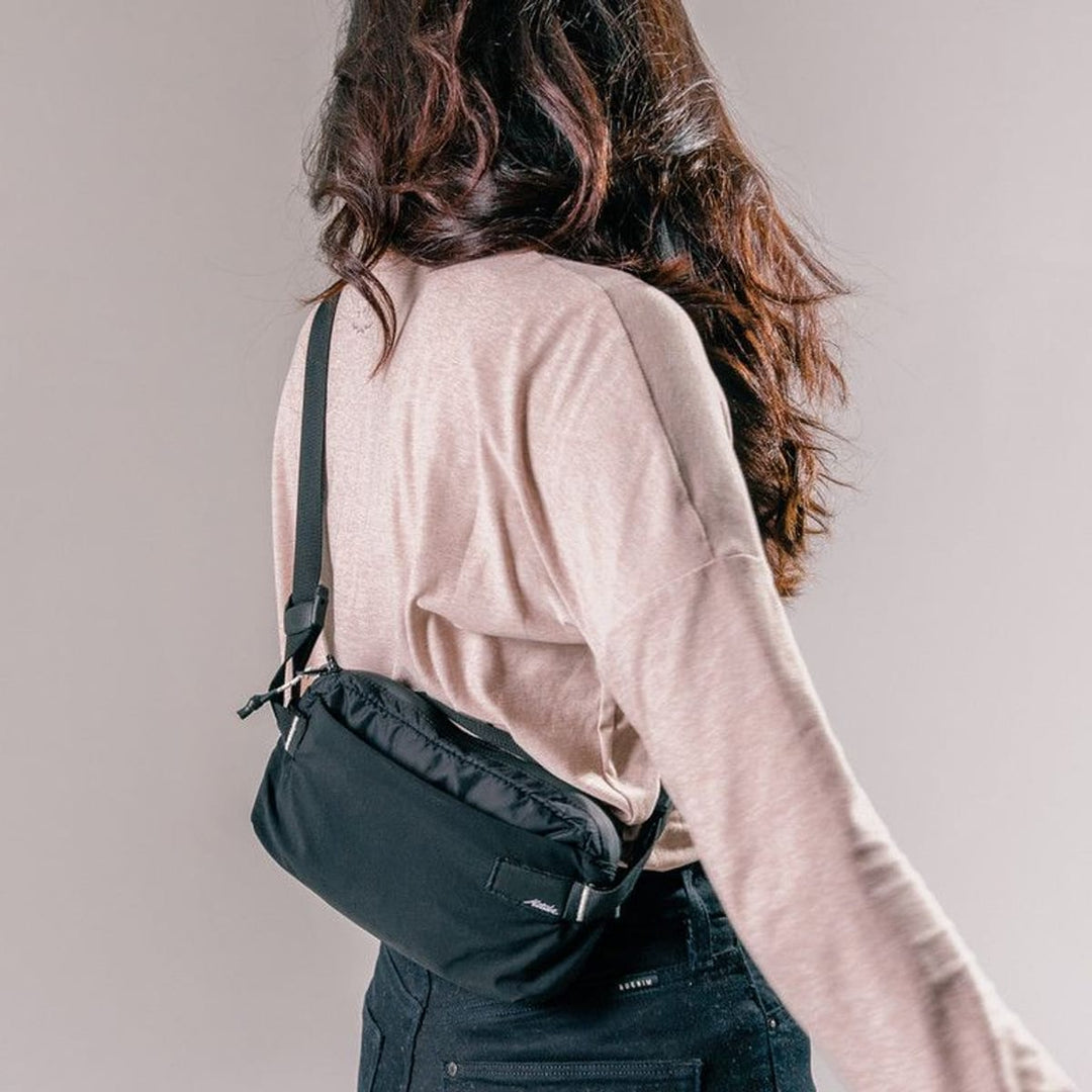 ReFraction Packable Sling 2L in use